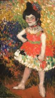 Painting of a woman with a red dress and flowered hem in many colors in the Picasso Museum